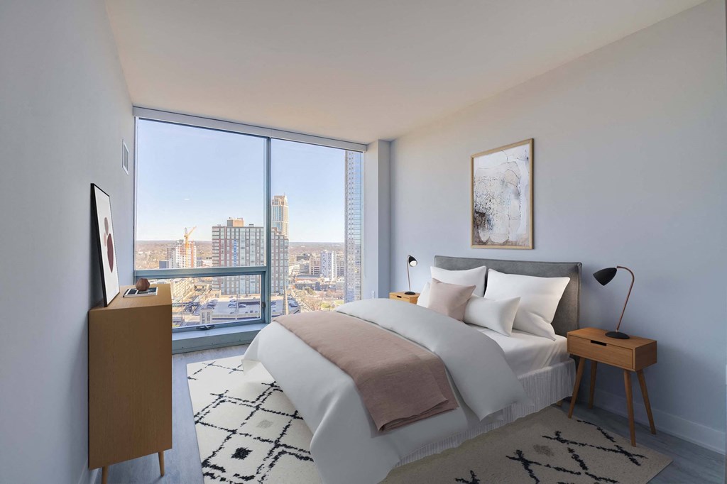 3thirty3 new rochelle ny apartment high rise photo of bedroom with large windows and modern furnishings