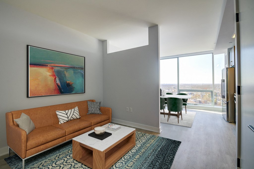 3thirty3 new rochelle ny apartment high rise photo of living area and dining room with large windows and modern furnishings