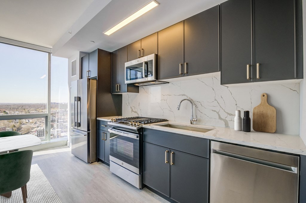 3thirty3 new rochelle ny apartment high rise photo of kitchen with modern furnishings and large windows