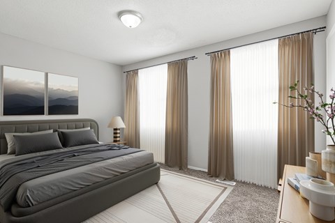 A bedroom with a large bed and a painting on the wall.