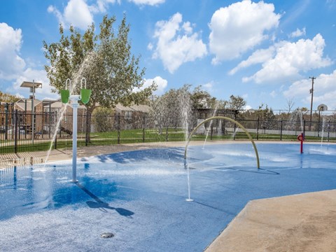 the preserve at ballantyne commons community pool with water sprinklers