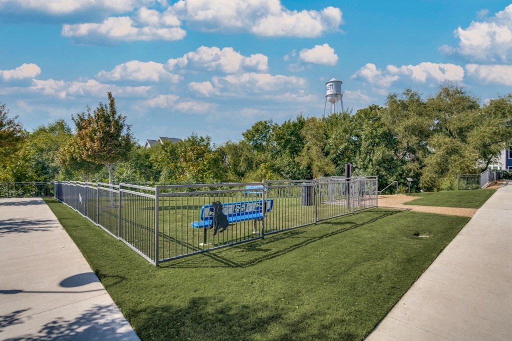 Pet-Friendly Apartments in Rowlett TX - Village of Rowlett - Pet Park Surrounded by Lush Landscaping