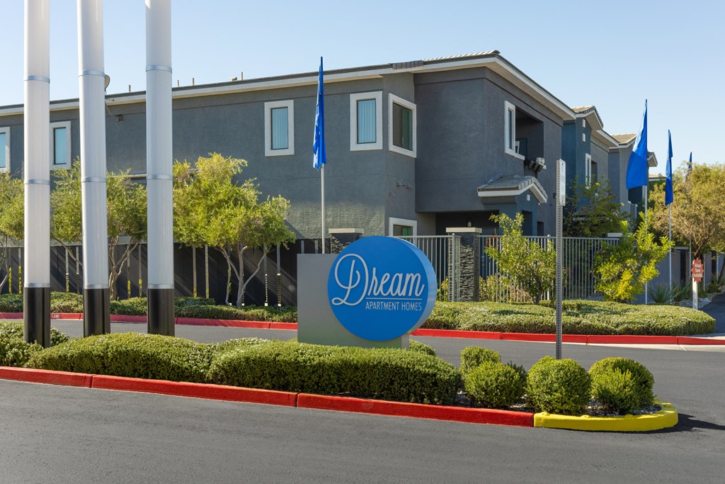 a blue dream sign in front of a building