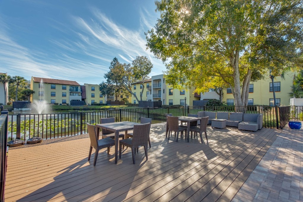 “Outdoor lounge seating area at Belara Lakes apartments near Egypt Lake / Lowry Park in Tampa, Florida