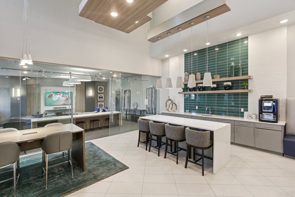 Clubhouse interior with lounge seating and open layout at Lotus at Starkey Ranch in Odessa, Florida.