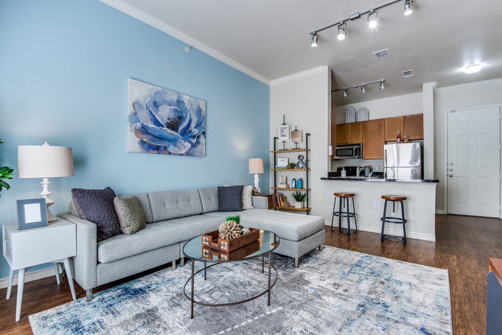 a living room with a couch and a table