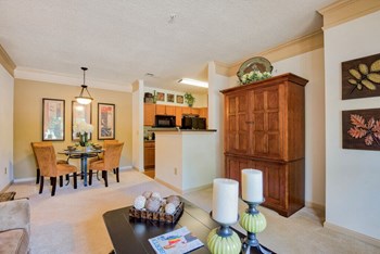 Tattersall Village Apartments in Hinesville Georgia photo of living room with view of kitchen and dining - Photo Gallery 2