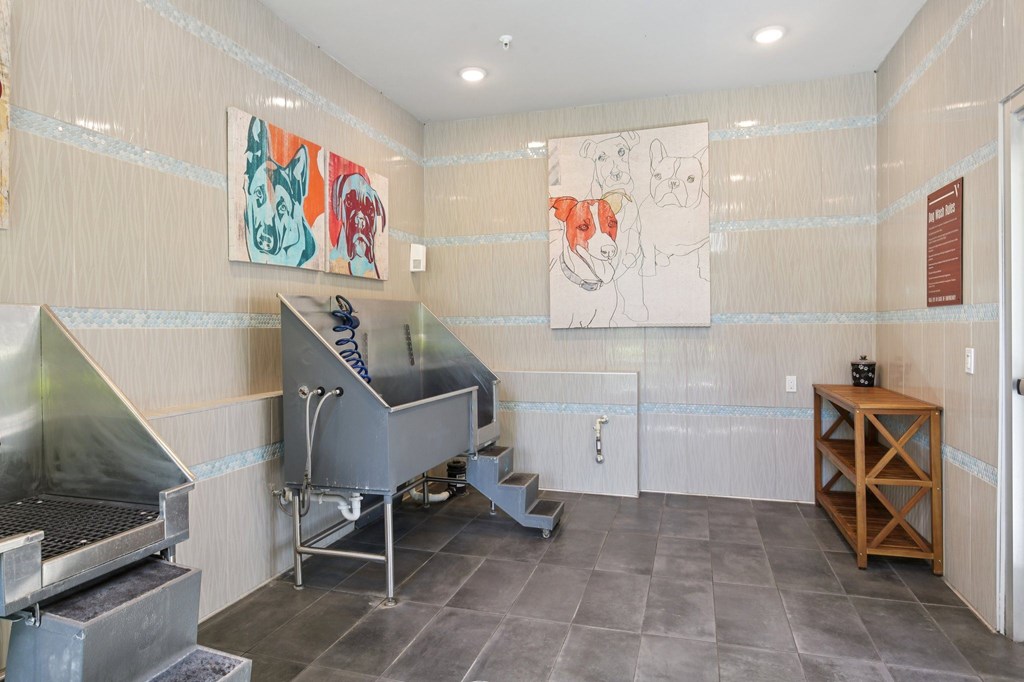 Dedicated pet spa with bathing tubs and cleaning facilities at Lotus at Starkey Ranch in Odessa, Florida.