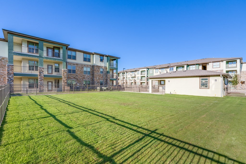 the preserve at ballantyne commons yard and apartment buildings