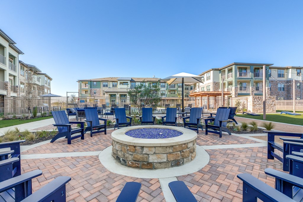 the preserve at ballantyne commons courtyard with blue chairs and a fire pit