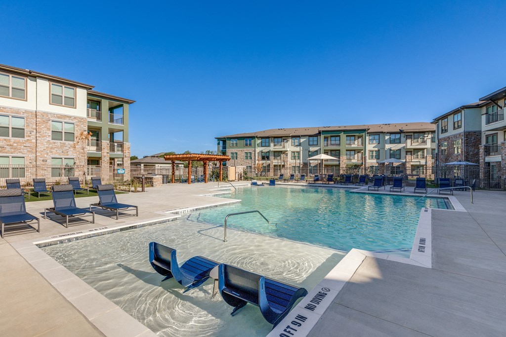 our apartments have a resort style pool with lounge chairs