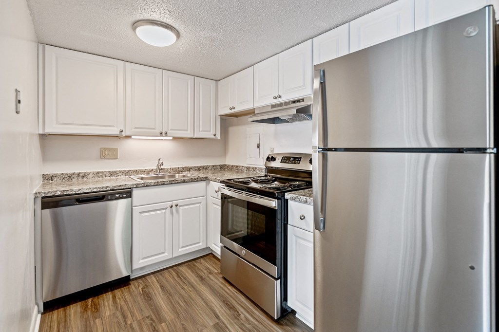 the preserve at ballantyne commons apartment kitchen with stainless steel appliances