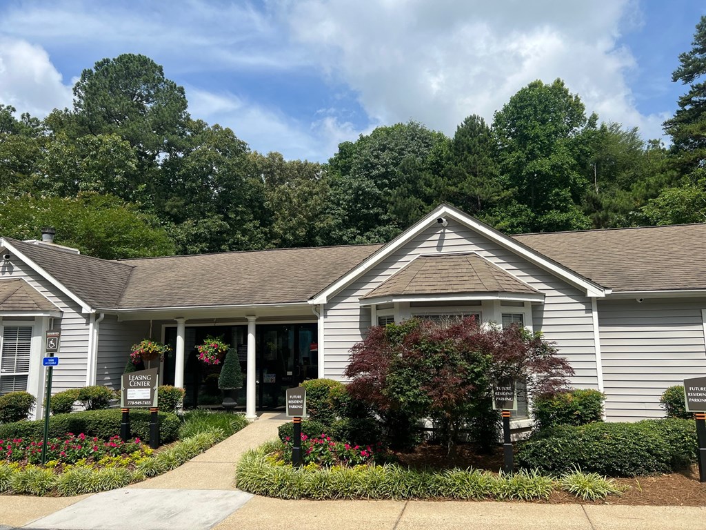 Place at Midway Douglasville GA a gray building with a sign in front of it