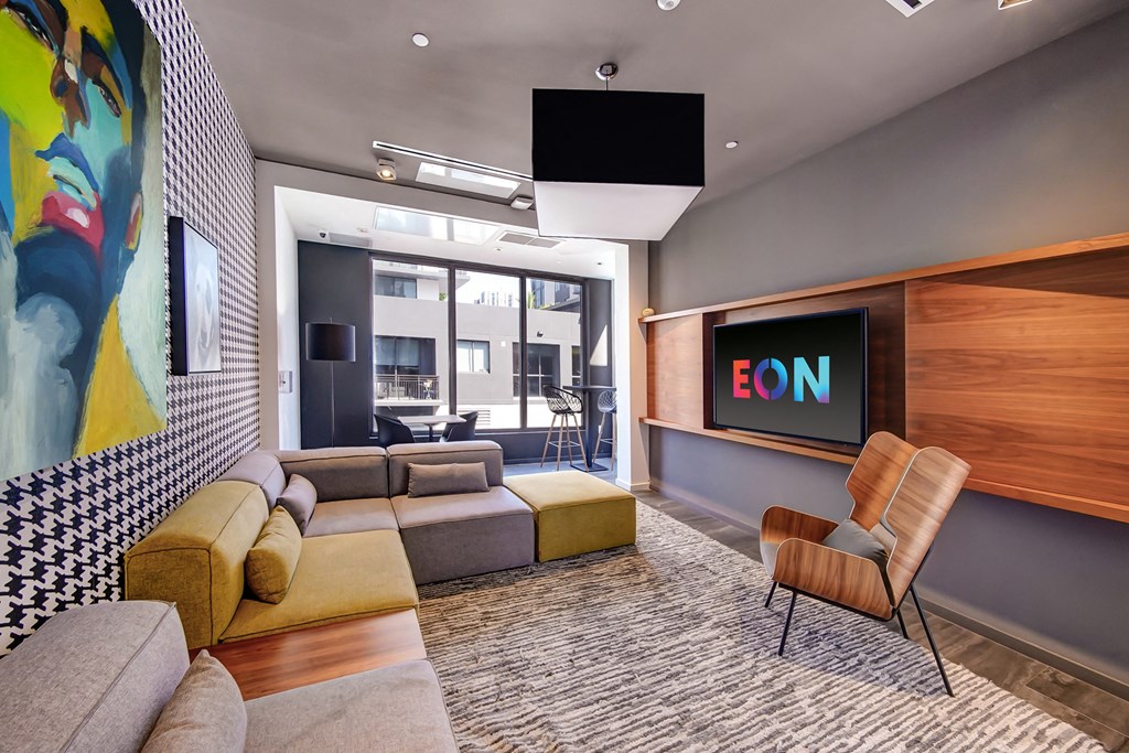 a living room with a couch and a tv