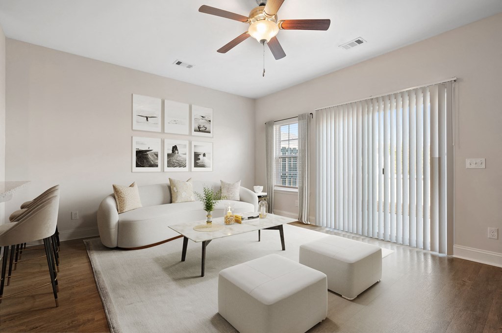 Omnia at Richmond Hill Townhomes in Georgia photo of living room with hardwood floors and ceiling fan