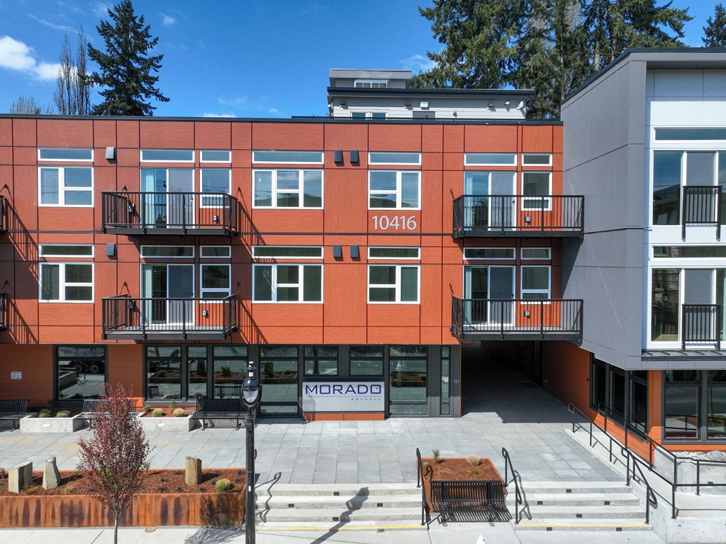 Luxury Apartments for Rent in Bothell, WA - Morado Bothell - Apartment Building Exterior, with Private Balconies, Windows, and Landscaping