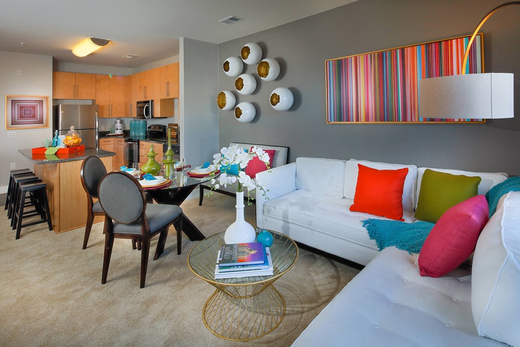 Kitchen and living room with couch and table