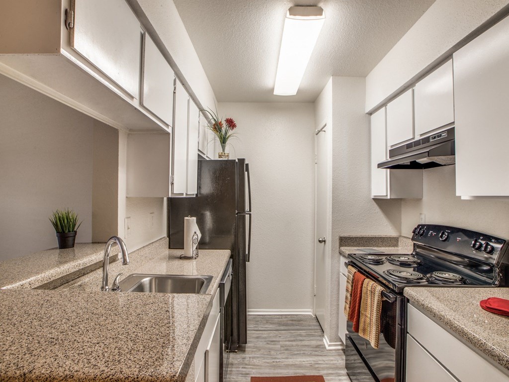 our spacious kitchens are equipped with stainless steel appliances and granite counter tops