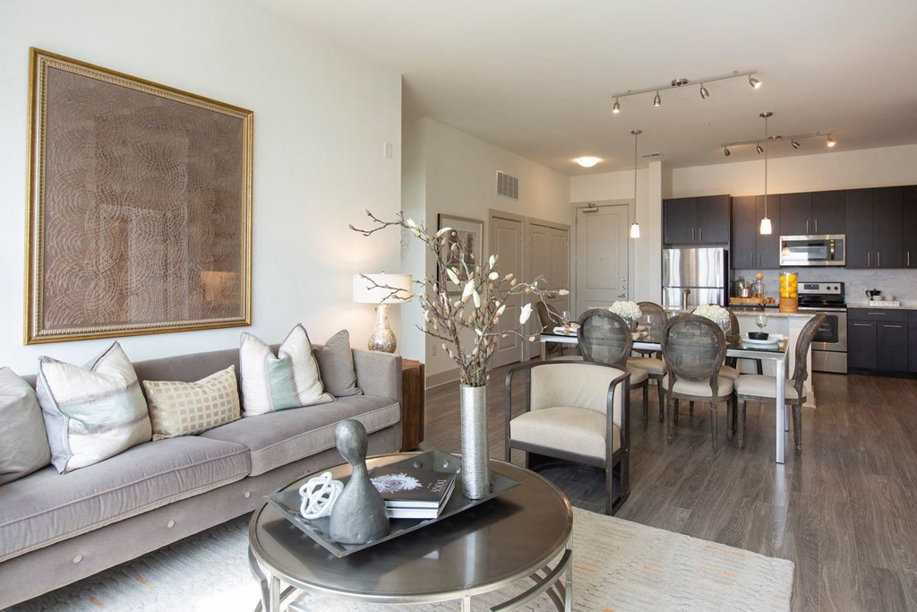 Atlanta Apartments - Arabelle Perimeter - living room with a couch and a table