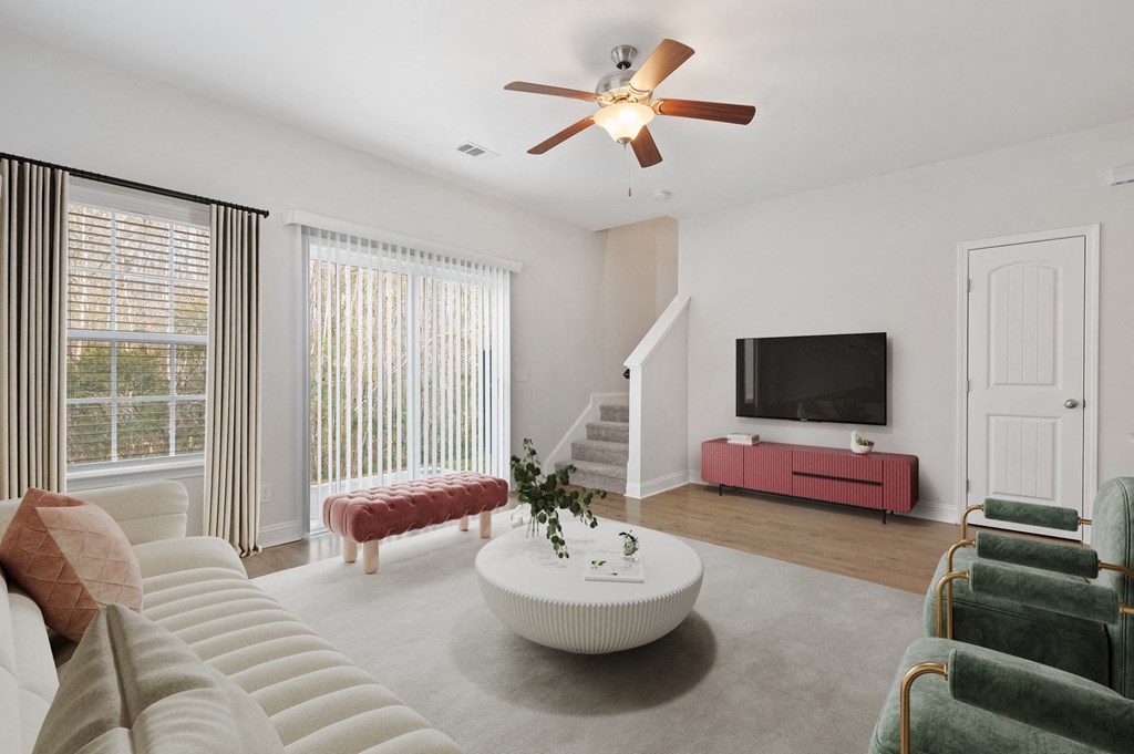 Harris Trail Luxury Townhomes for rent Richmond Hill, GA photo of a living room with a couch and a coffee table