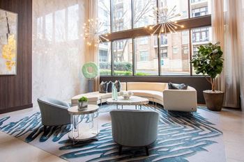 Apartments In Sandy Springs, GA for Rent – Arabelle Perimeter – seating area in clubhouse with large windows