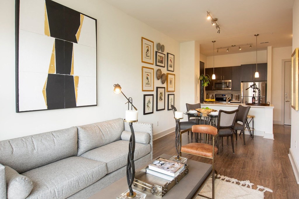 Apartments in Atlanta, GA for rent - Arabelle Perimeter - living room with a couch and a table