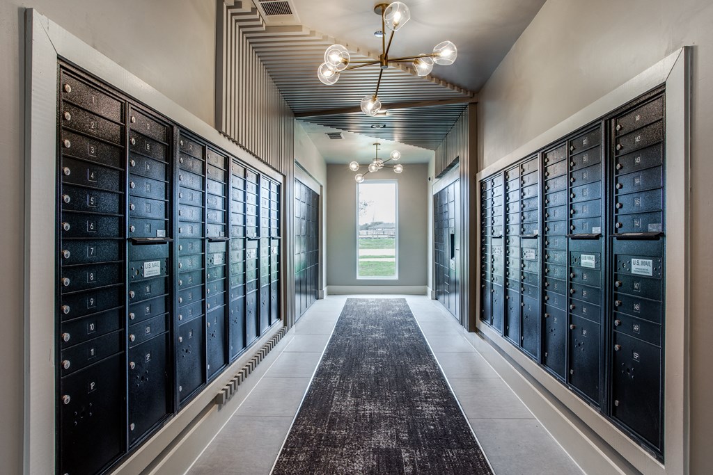 a look down the hallway of the locker room at the west end lodge apartments in beaum