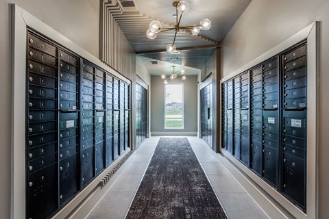 a look down the hallway of the locker room at the west end lodge apartments in beaum