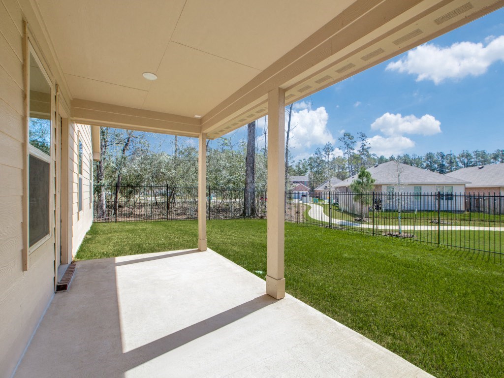 Backyard With Green Space Backyard With Green Space at Amber Pines at Fosters Ridge, Conroe, TX