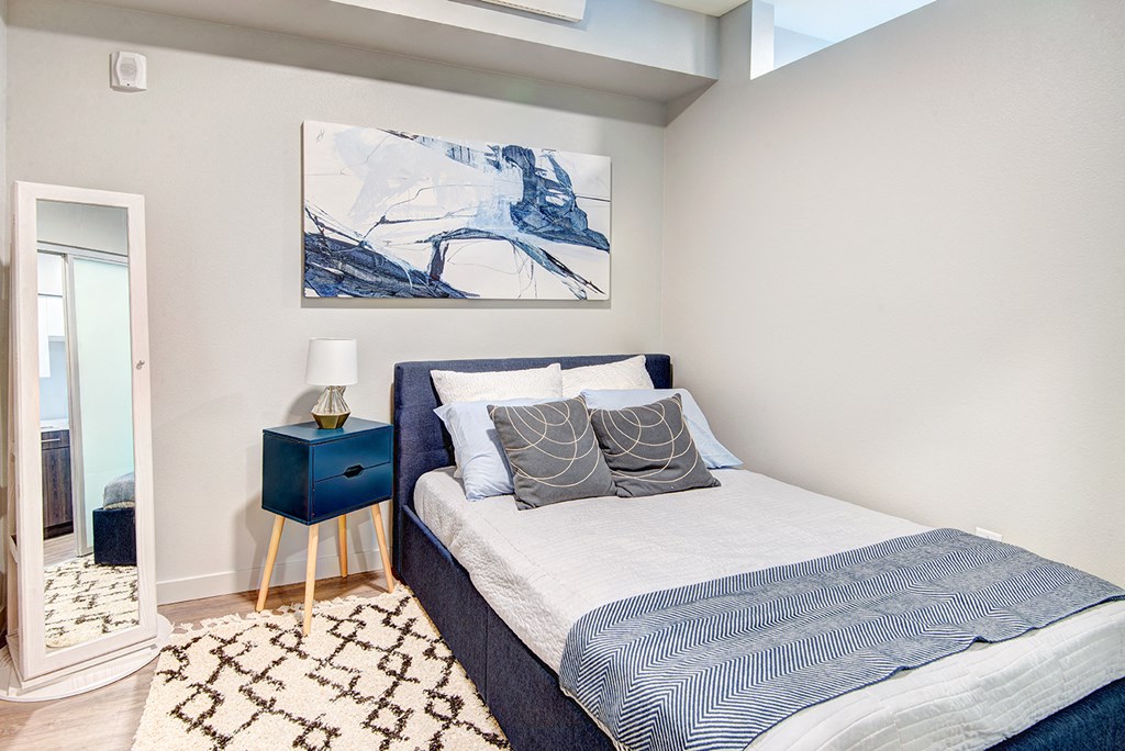 One-Bedroom Apartments In Bothell, WA - 98th Avenue - Bedroom With Luxury Vinyl Plank Flooring