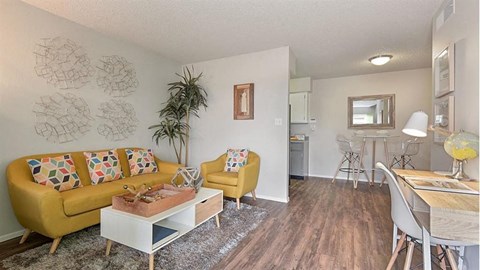 a living room with a couch and a table