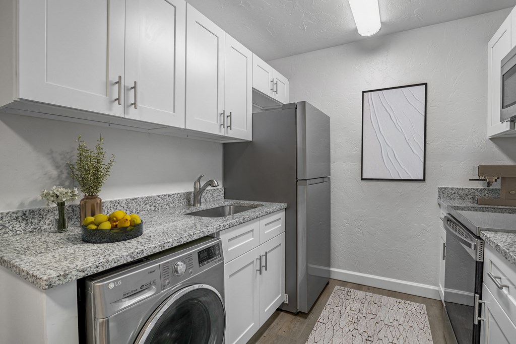 Addison Lane Apartment homes in Gainesville Florida photo of kitchen with stainless steel appliances
