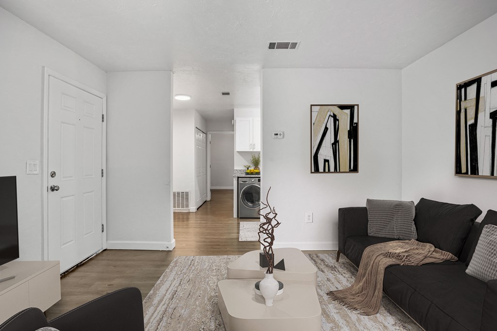 Addison Lane Apartment homes in Gainesville Florida photo of a living room with a couch and a coffee table