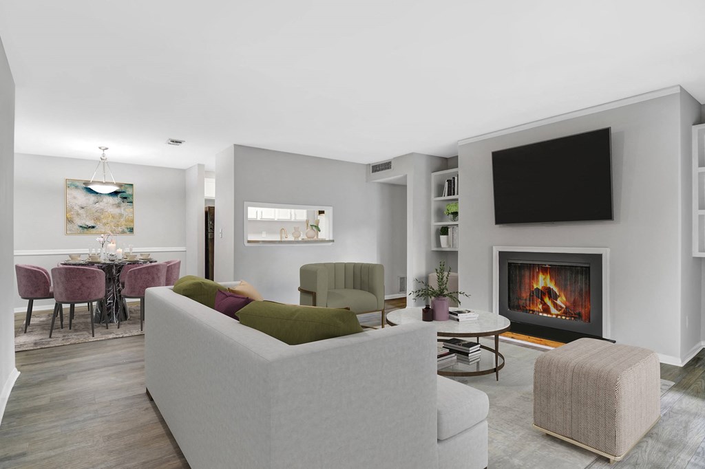 Affinitee at Stone Mountain Apartments photo of a living room with a couch and a fireplace