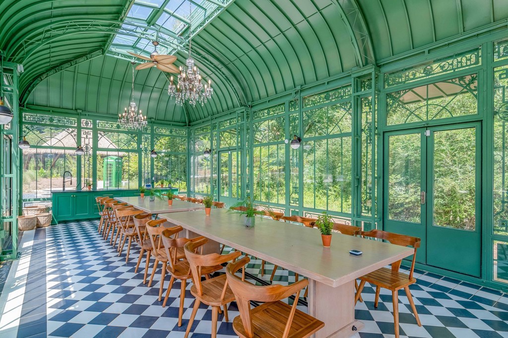 Affinitee at Stone Mountain Apartments photo of the pavillon with a long table and chairs