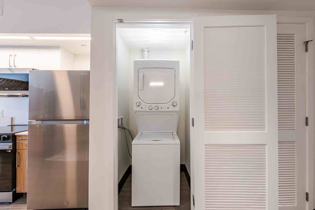In-unit washer and dryer in a pet-friendly Miami Beach apartment, providing residents with the convenience and privacy of laundry at home.