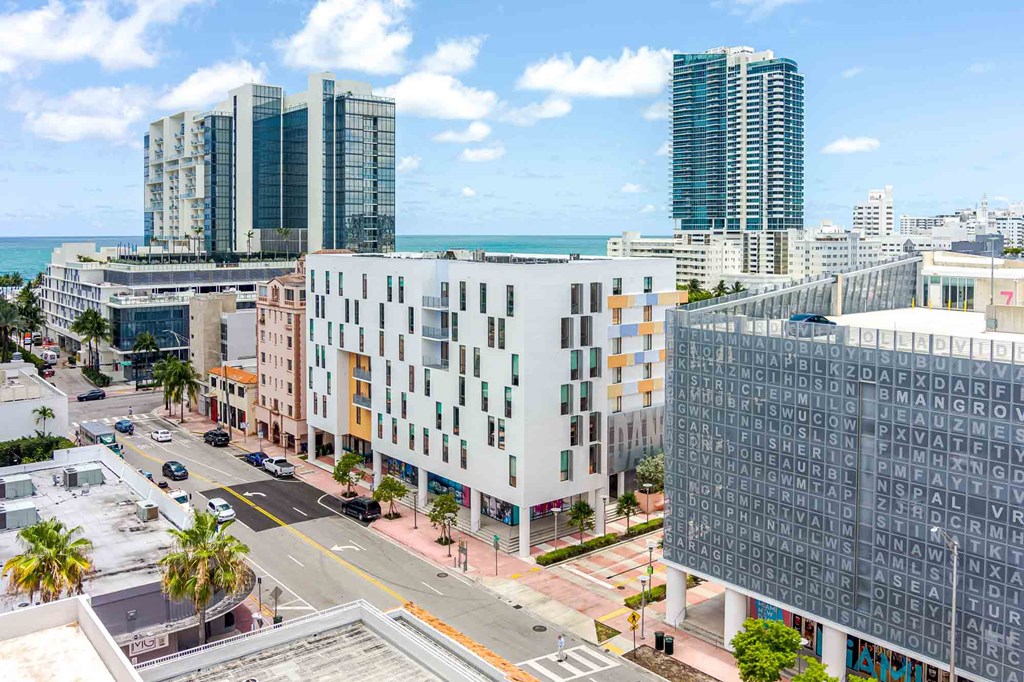 Elevated view of a Miami Beach apartment property with multiple buildings and close proximity to city amenities.
