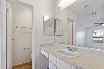 Arabella apartments in Henderson Nevada photo of bathroom with long vanity - Photo Gallery 6