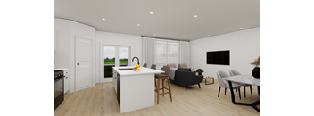 a kitchen and living room with white walls and wood flooring