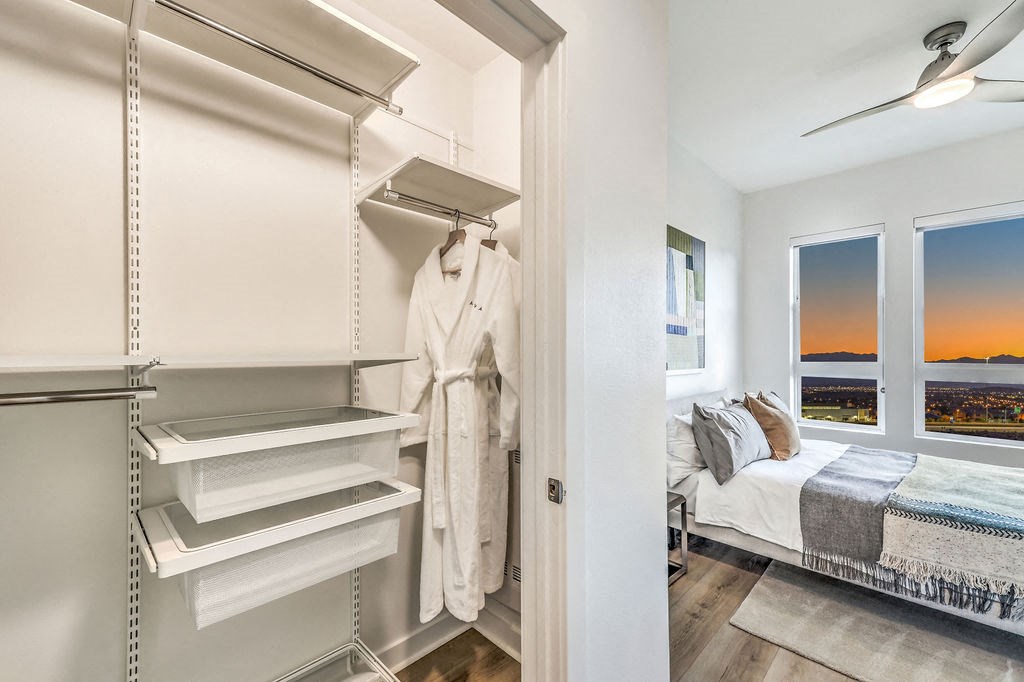 a walk in closet in a 555 waverly unit