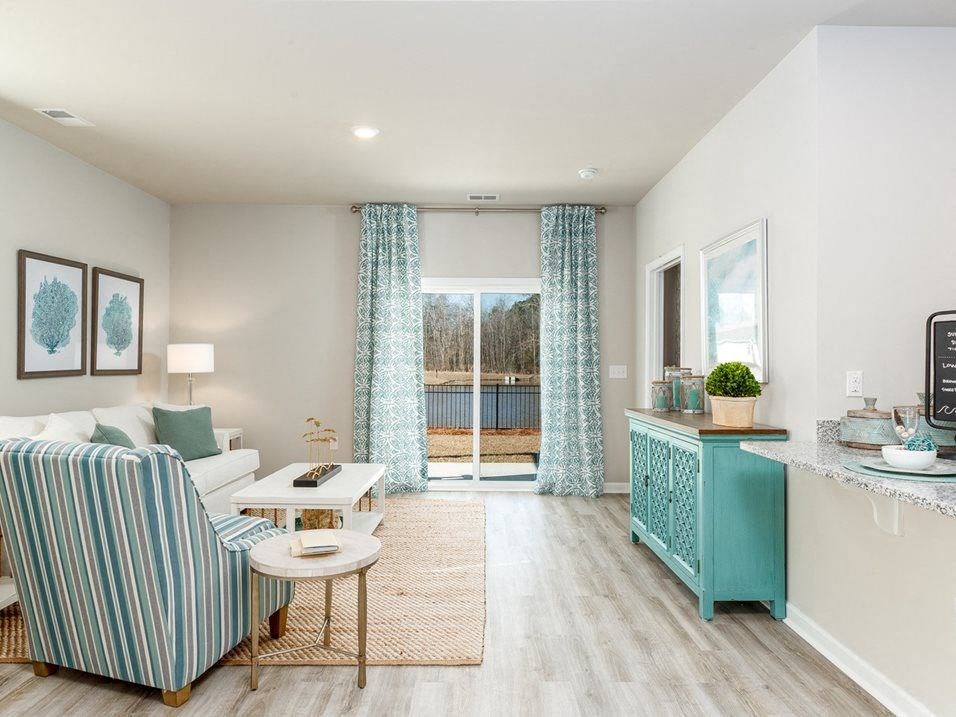 a living room with a couch and a table