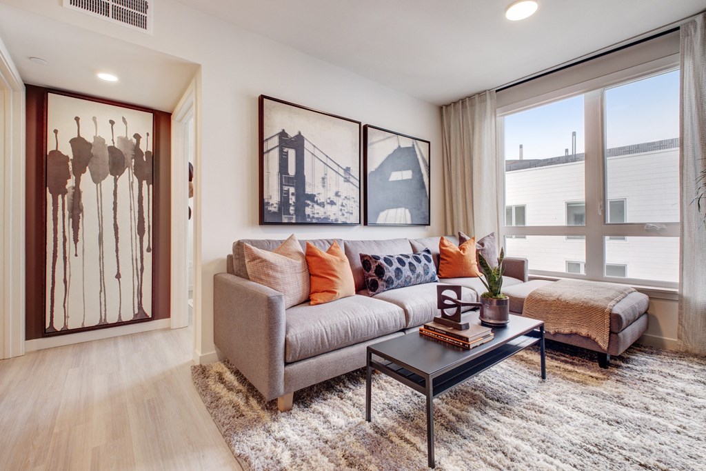 a living room with a couch and a coffee table