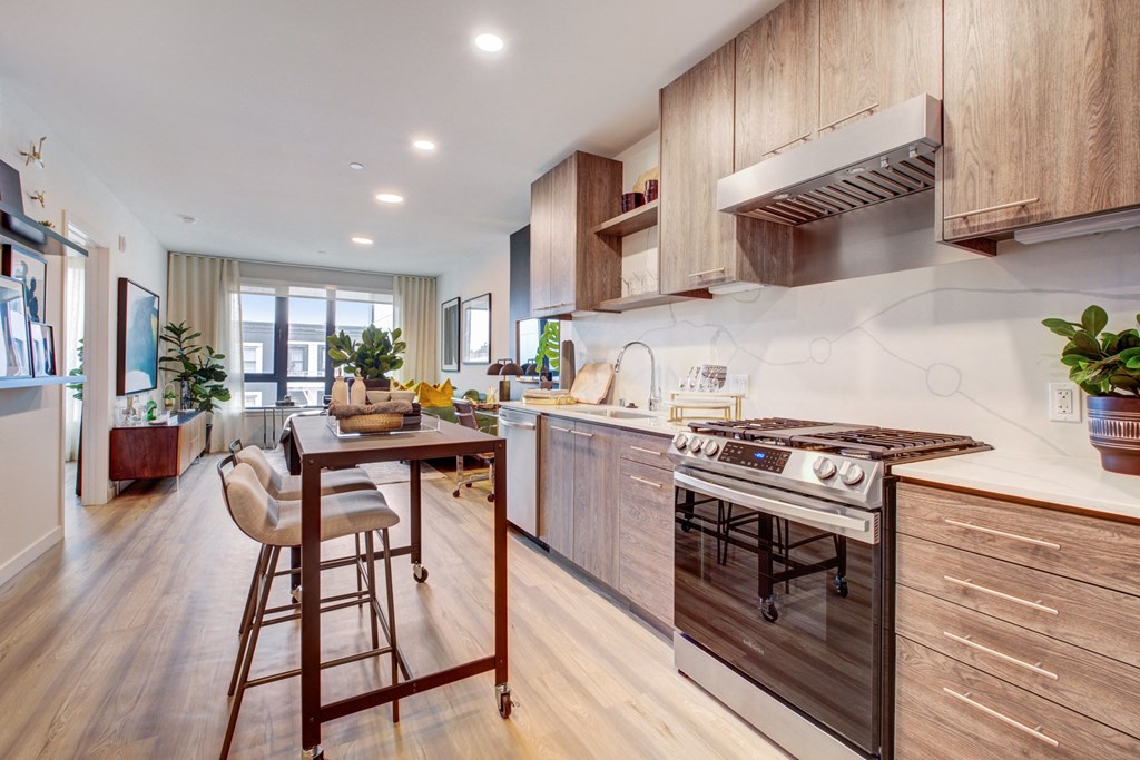 a kitchen and dining area in a modern apartment