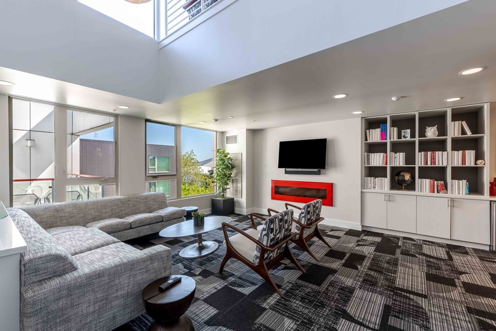 Clubroom With TV at Astro Apartments, Seattle, Washington