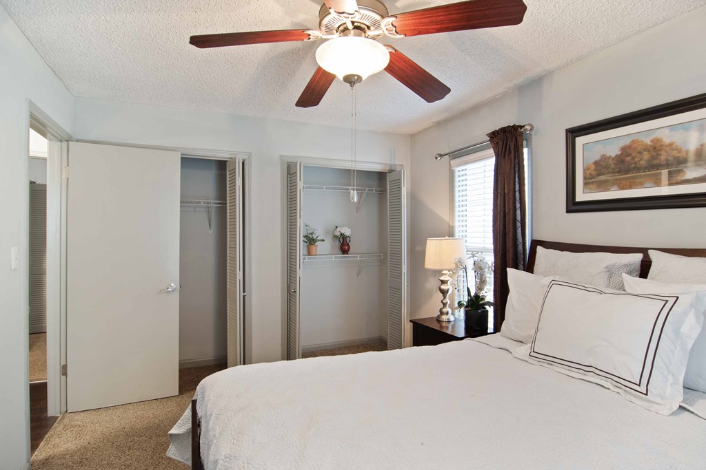 Audubon Briarcliff apartments in Atlanta Georgia photo of bedroom with ceiling fan