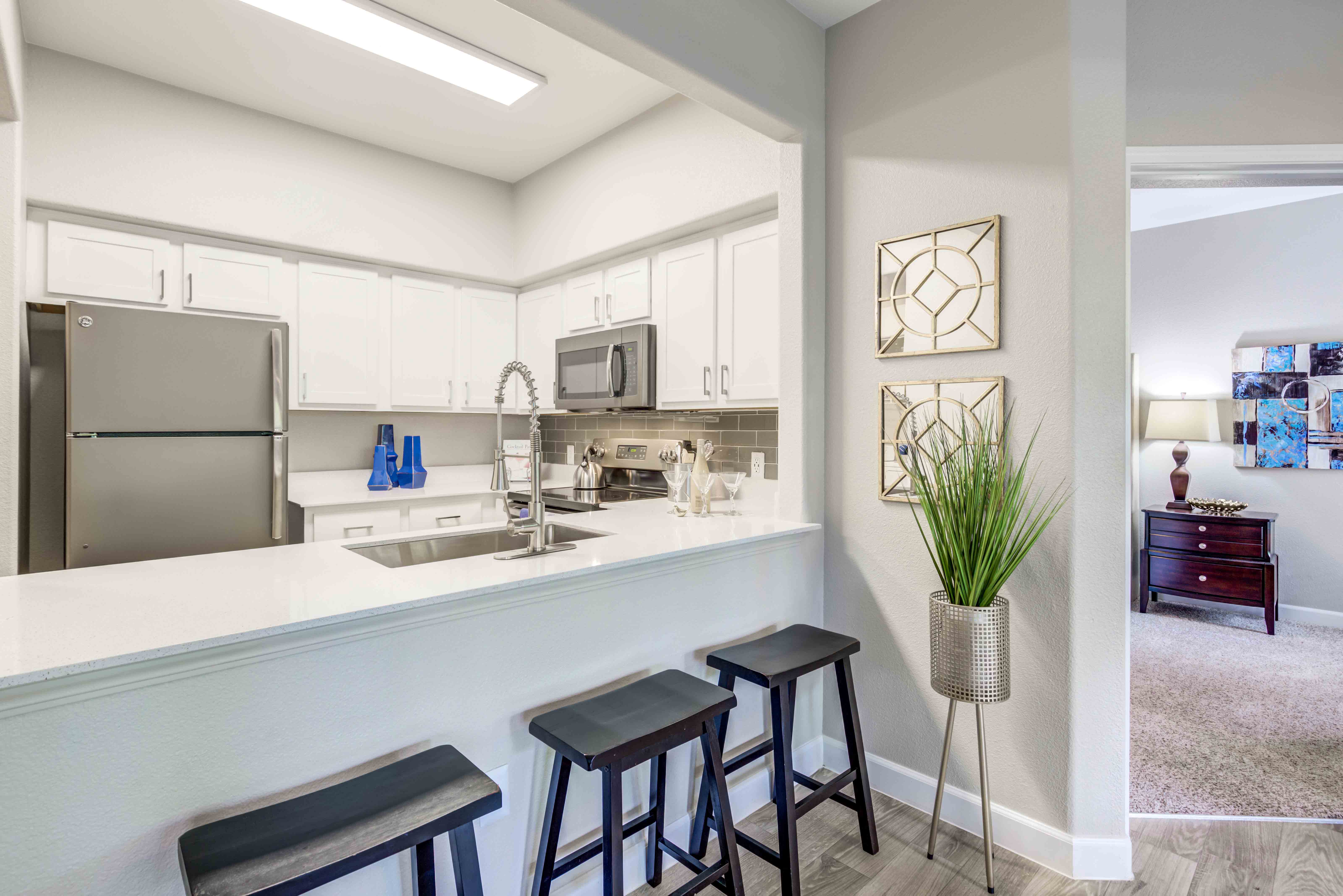 Modern kitchen with stainless steel appliances