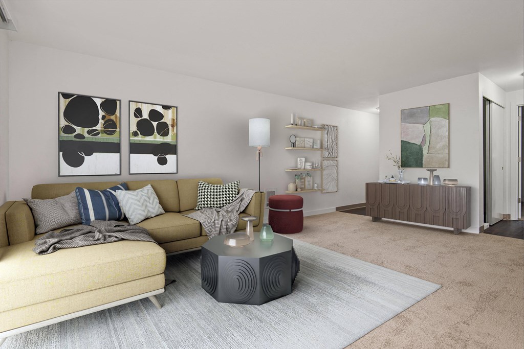 a living room with a couch and a coffee table