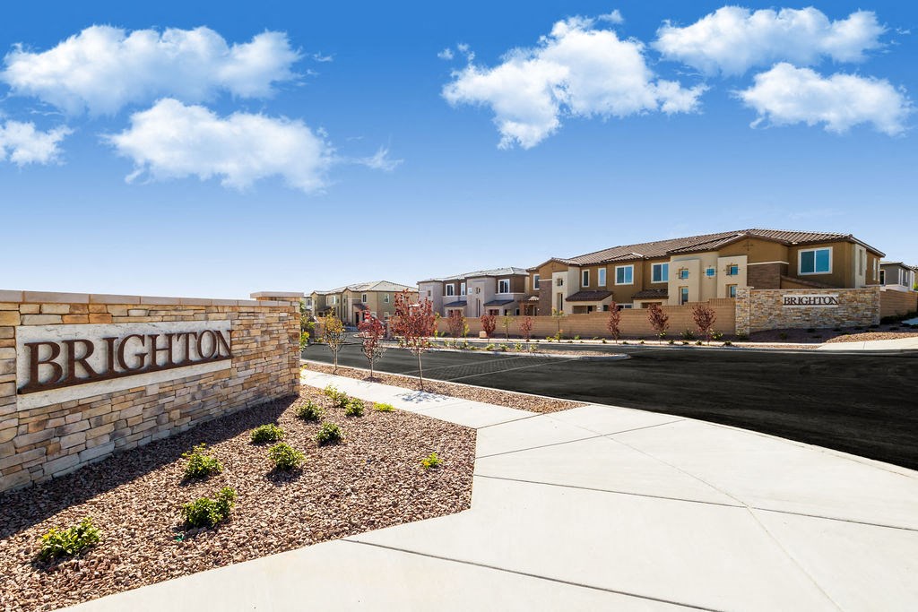 a building with a sign on the side of a street