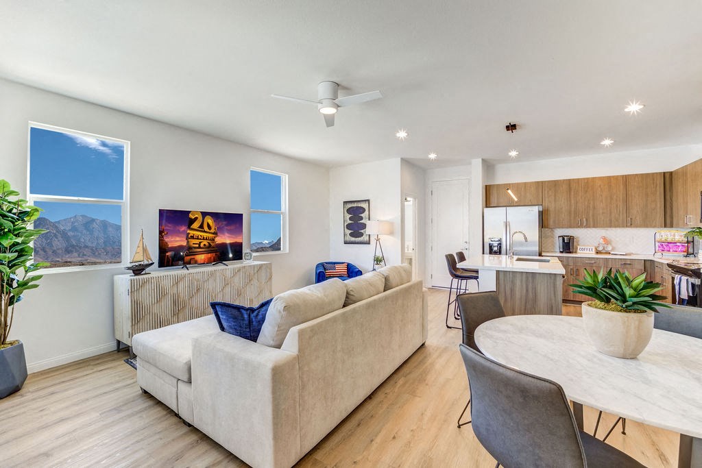 a living room with a couch and a table