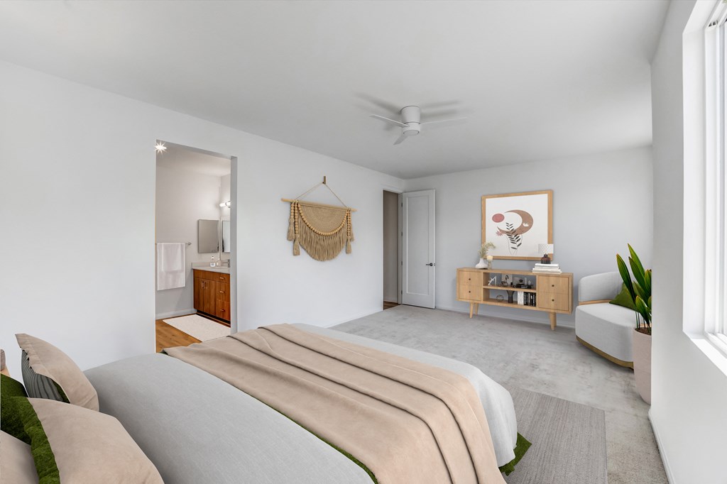 a bedroom with a bed and a dresser